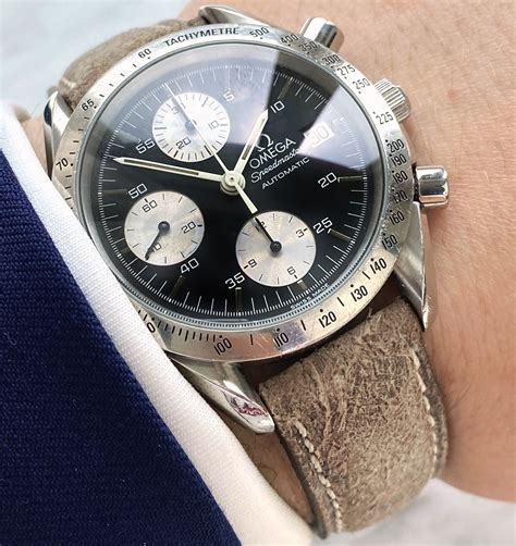 omega speedmaster panda reverse dial.